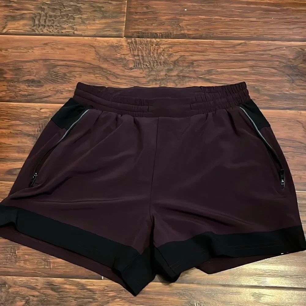 Lululemon Purple Black Zipped Pockets Athletic Shorts